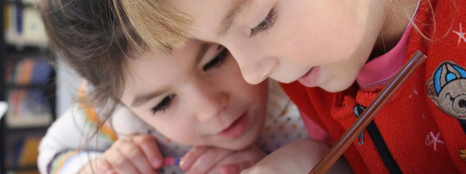 Photo of children coloring